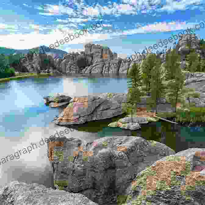 A Panoramic Landscape Of The Black Hills, With Rolling Hills, Forests, And Rock Formations. He Sapa Woihanble: Black Hills Dream