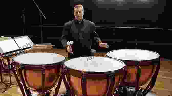 A Timpani Instructor Guiding A Student On Proper Playing Technique The Complete Timpani Method: Basic Theory * Technique * Intonation * Timpani Repertoire From The Classics